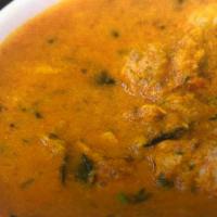 Lamb Korma · Served with rice.Lamb cooked in a rich creamy curry 