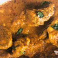 Lamb Vindaloo · Served with rice .Lamb cooked with curry, potatoes and splash of vinegar. 