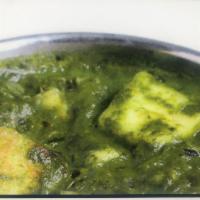 Saag Paneer · Served with rice .Spinach, ginger, garlic, onion and Indian cheese cooked together 