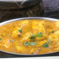 Mutter Paneer · Served with rice .Green peas cooked in a creamy curry with Indian cheese and spices 