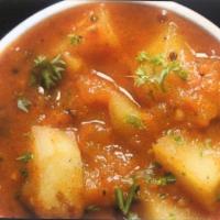 Punjabi Aloo · Served with rice .Potato cooked in traditional Indian spices 