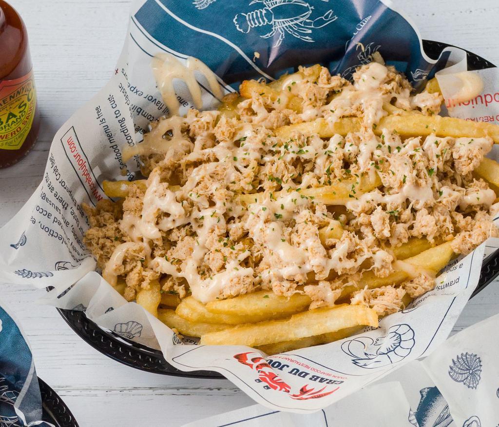 Crab Meat Fries · Maryland blue crab meat on top of French fries served with remoulade sauce