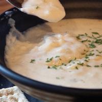 Clam Chowder · A thick hearty soup consisting of clams, potatoes, onions within a milk or cream base.
