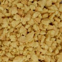 Crushed Vanilla Cookies · This crunchy crumbly topping is made from chopped vanilla wafers. Comes in a 4 oz container. 