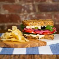 The Greek Goddess · Artisanal Hummus, Pickled Red Onions and Radishes, Tomato, Cucumber, Mesclun, and Balsamic V...