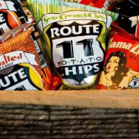 Route 11 Potato Chips · Barbeque, Dill, Sour Cream and Chive and Lightly Salted chip options.