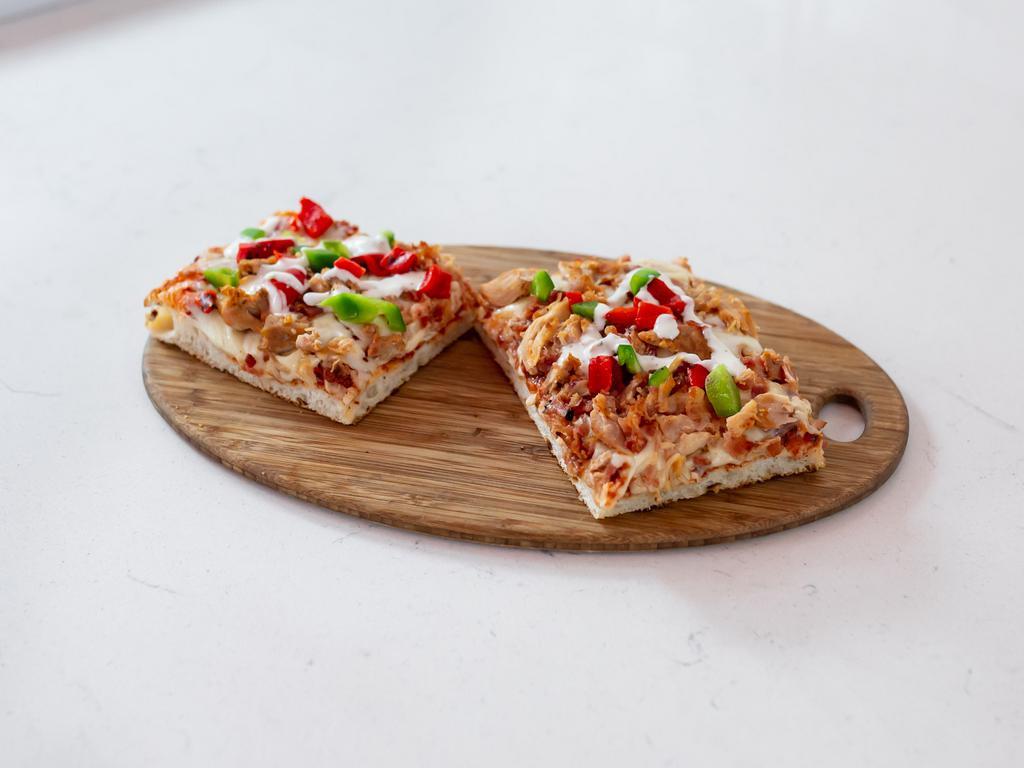 Chicken Bacon Ranch Signature Pizza · House red sauce, smoked chicken, minced garlic, red and green peppers, creamy mozzarella, topped with crispy bacon and classic ranch.
Feeds 4/6 People