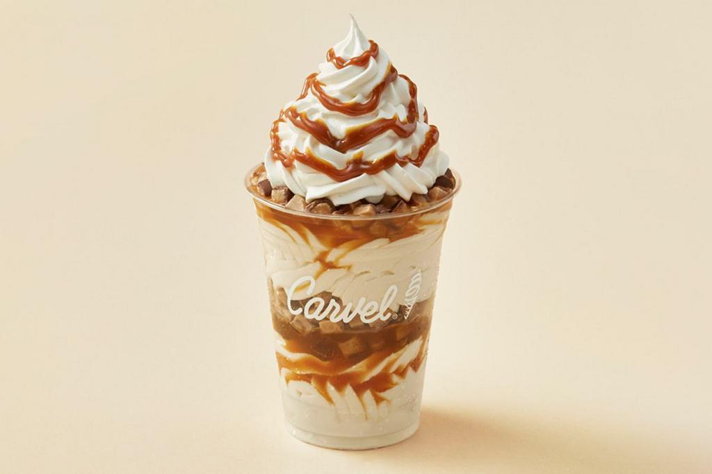 Heath® Sundae Dasher®  · Layers of Heath® pieces, vanilla ice cream and caramel topped with whipped cream and caramel drizzle.