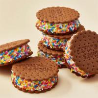 Deluxe Flying Saucers® (6-Pack) · Soft ice cream rolled in sprinkles and sandwiched between two Flying Saucer® chocolate wafer...