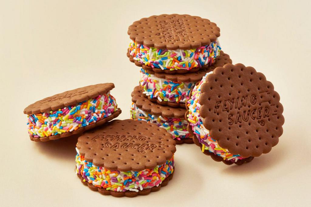 Deluxe Flying Saucers® (6-Pack) · Soft ice cream rolled in sprinkles and sandwiched between two Flying Saucer® chocolate wafers. Served as a 6 pack for multiple people to enjoy.