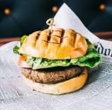 Silence When You Eat the Lamb Burger · Ground lamb, spicy feta spread, lettuce and tomato.