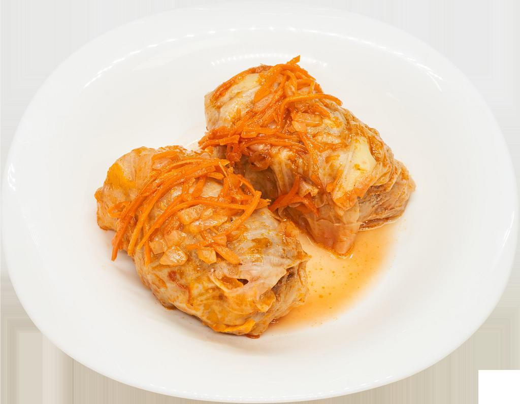Stuffed Cabbage(1 pc) · Cabbage leaves, rice, ground beef, mix pepper, dill, carrots, onion, and spices.