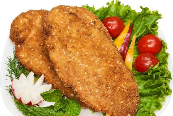 Chicken Schnitzel(1 pc) · Chicken breast, eggs, breadcrumbs, flour, salt, oil, and parsley.