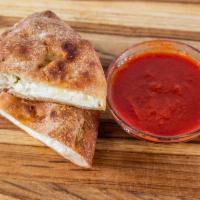 Three Cheese Calzone · Mozzarella, provolone & ricotta, red sauce to dip 
