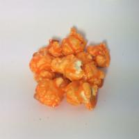 Orange Popcorn · Candy-coated popcorn with orange flavor and rich orange color.
