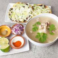 78. Pozole · Corn soup with pork served with 2 homemade tostadas.