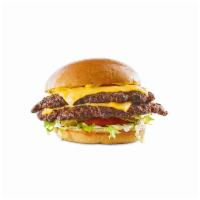 All-american Cheeseburger · Hand-smashed double patty topped with American cheese, lettuce, tomato, pickles, mustard, ma...