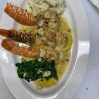 Lobster Francaise  · Cold water, lobster tail, eggs washed and pan sauteed, lemon, butter, and white wine, served...