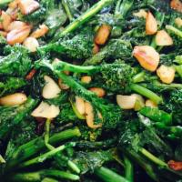 Broccoli Rabe · Garlic and oil. Add sausage for an additional charge.