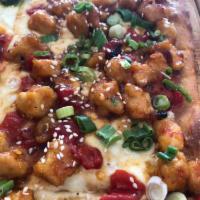 General Tso's Pizza · Tender bites of chicken in a slightly spicy Tso’s sauce topped with scallions and sesame see...
