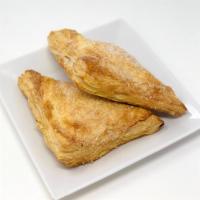 Apple Turnover · A puff pastry triangle filled with sliced apples and cinnamon.