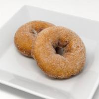 Cinnamon Sugar Cake Donut · Our plain cake donuts covered in cinnamon and sugar. So sweet and sugary you'll have to lick...