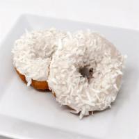 Coconut Cake Donut · Our plain cake donut with a white glaze and coconut on top. You might need a pineapple danis...
