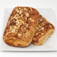 Almond Croissant · A croissant pocket baked with an almond filling and topped with sliced almonds.