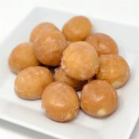 Dozen Donut Holes, Glazed · The center is the best part! Glazed donut holes packed by the dozen and there's no harm in l...