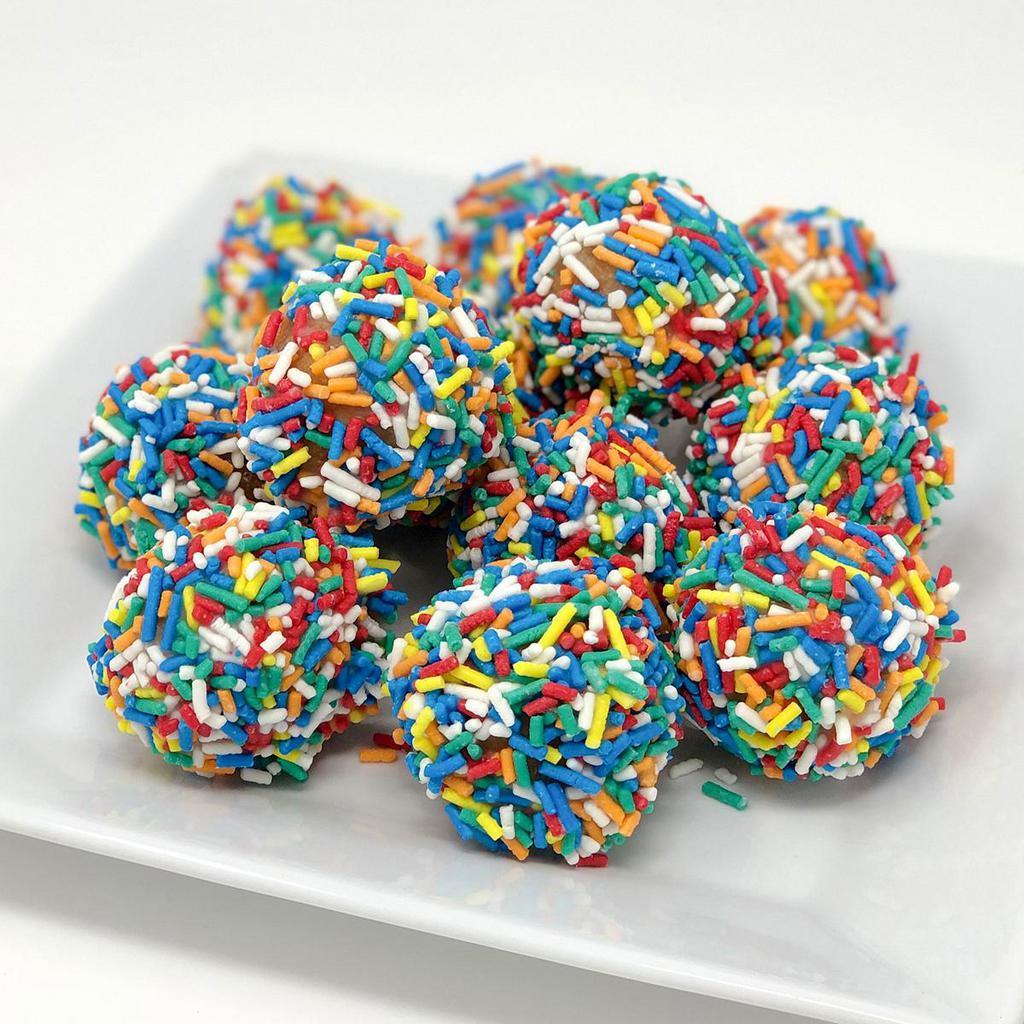 Dozen Donut Holes, Sprinkles · Tiny cake donut holes rolled in sprinkles, they taste as good as they look and the kids love them!