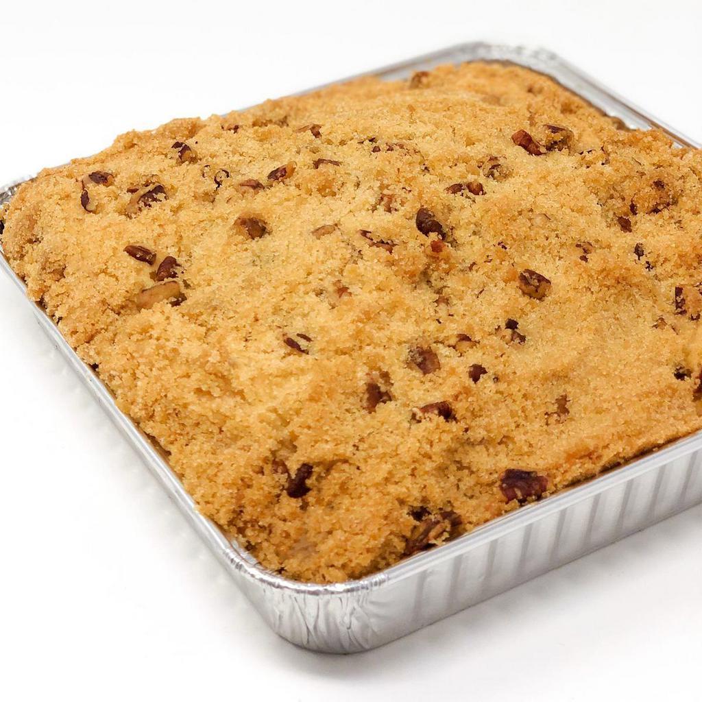 Sour Cream Coffee Cake · Yummy rich buttery cake topped in streusel and pecans. The sour cream makes this cake light and very tasty!