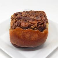 Sticky Buns · Our traditional baked cinnamon roll covered in pecans and caramel! You can't take your eyes ...