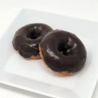 Vanilla Cake Donut with Chocolate Icing · White cake donut with a chocolate glaze.
