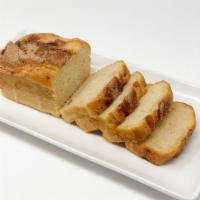 Apple Cinnamon Bread · A loaf of our moist quickbread with apples and cinnamon baked throughout. A great morning br...