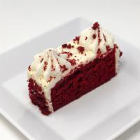 Red Velvet Cake Slice · A southern favorite! Our red velvet cake with cream cheese icing!