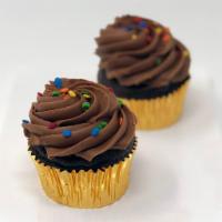 Sprinkled Cupcake - Chocolate · Great for anyone who loves chocolate! Our decadent chocolate cake with our chocolate butterc...