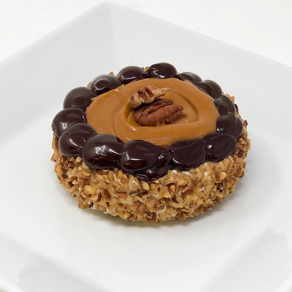 Mini Cheesecakes - Turtle · No bake type cheesecake with pecans around the sides then topped in chocolate and caramel.