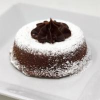 Molten Chocolate Cake · A rich, gooey chocolate center lays in the middle of this moist chocolate cake just waiting ...