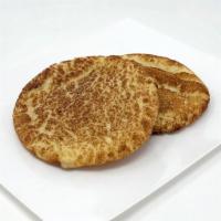 Snickerdoodle Cookie · A soft chewy cookie rolled in cinnamon and sugar and everything nice!