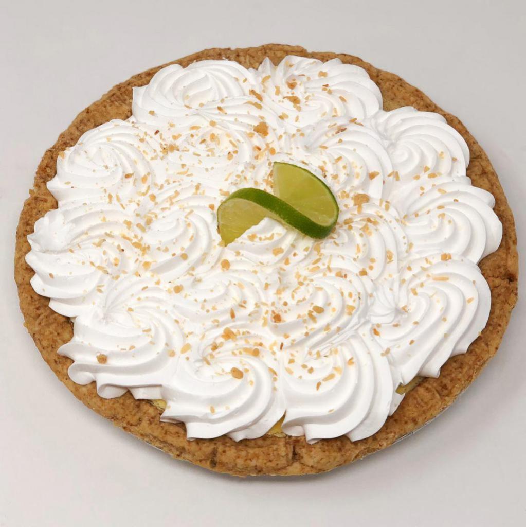Key Lime Pie · Traditional key lime filling made with real key lime juice. Topped with whip cream and lime slices, this pie will make you wish you were spending your summer in the Florida Keys!