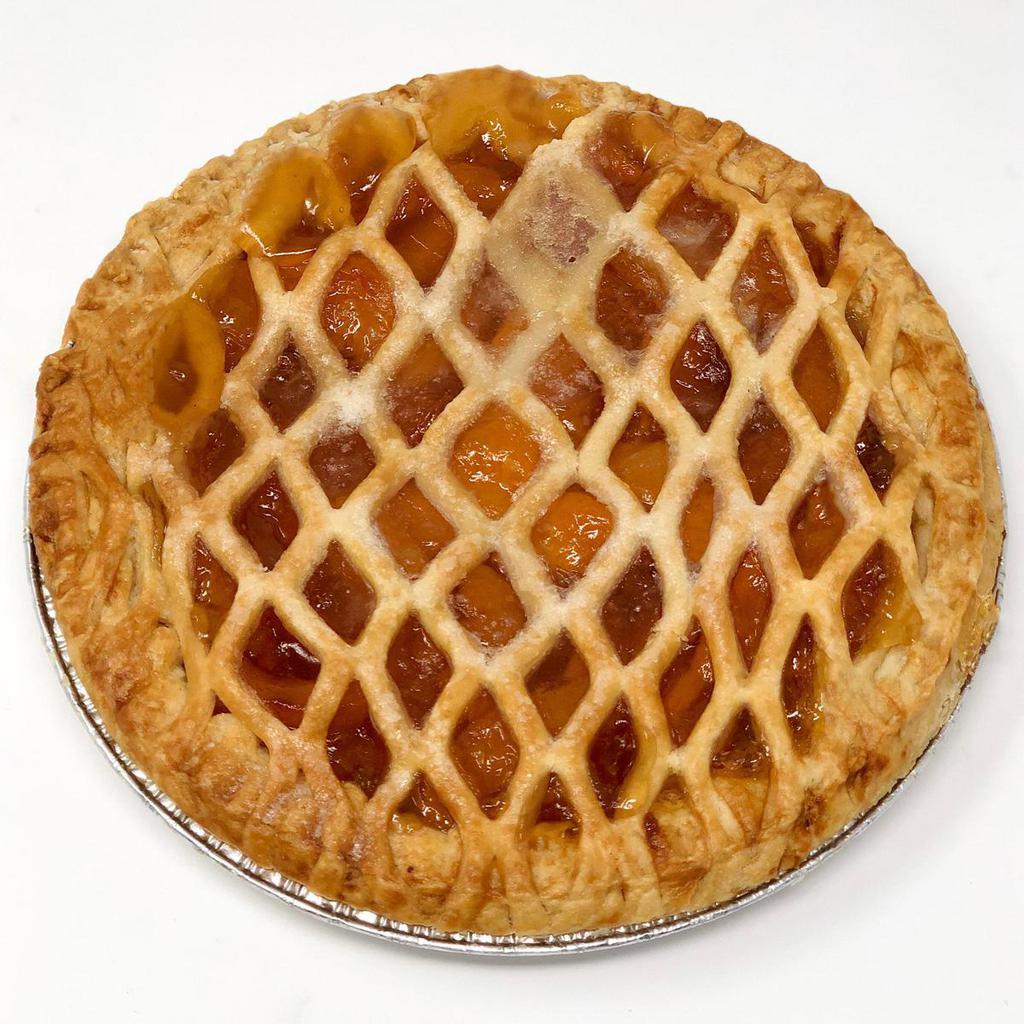 Peach Pie · Traditional peach pie filling with a flaky crust on top. When the Peach Porter Festival rolls around every July these pies go like hot cakes!