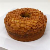 Cinnamon Streusel Cake · A bundt cake with a pecans and cinnamon swirled in, topped with caramel and pecans. Great fo...