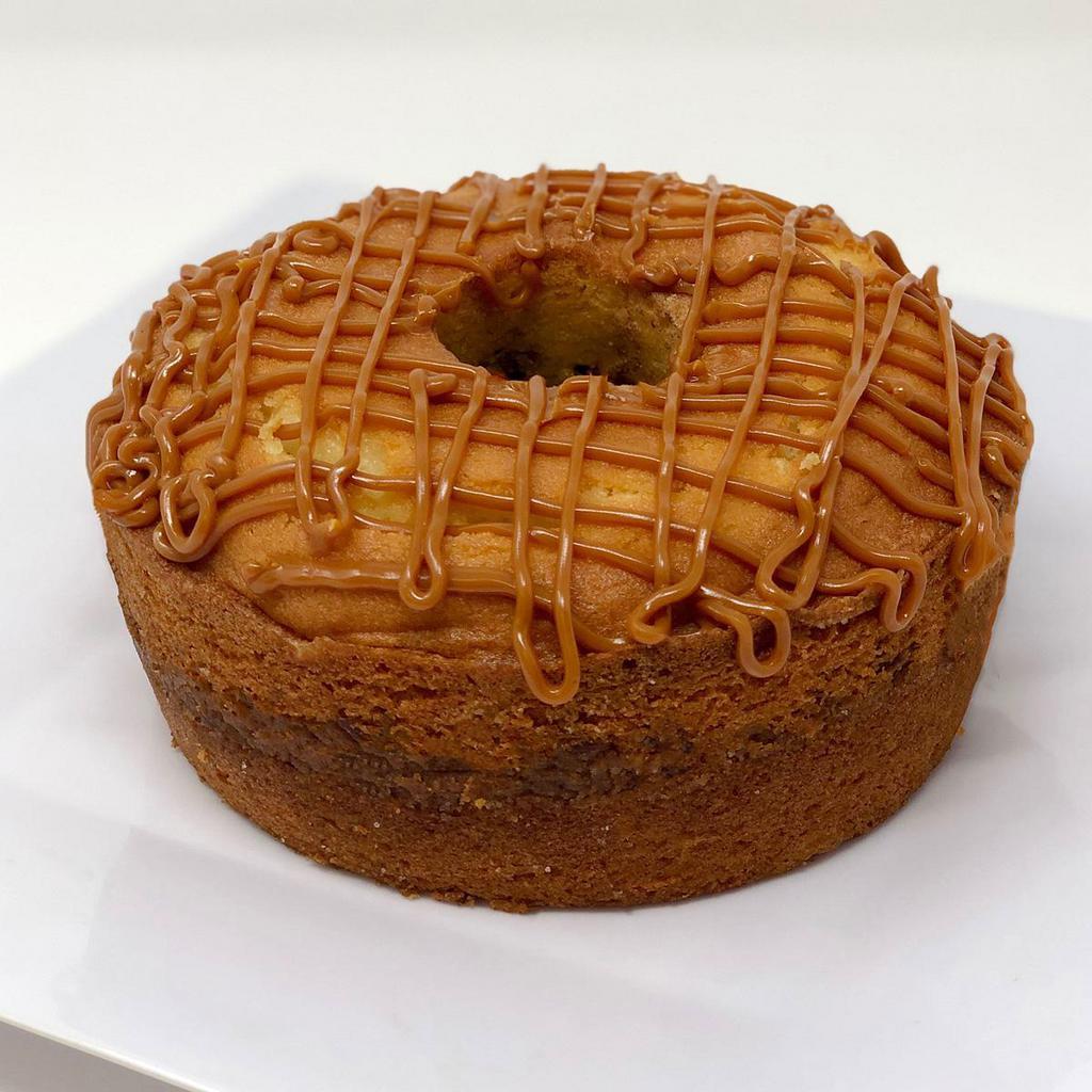 Cinnamon Streusel Cake · A bundt cake with a pecans and cinnamon swirled in, topped with caramel and pecans. Great for a breakfast coffee cake or an afternoon snack!
