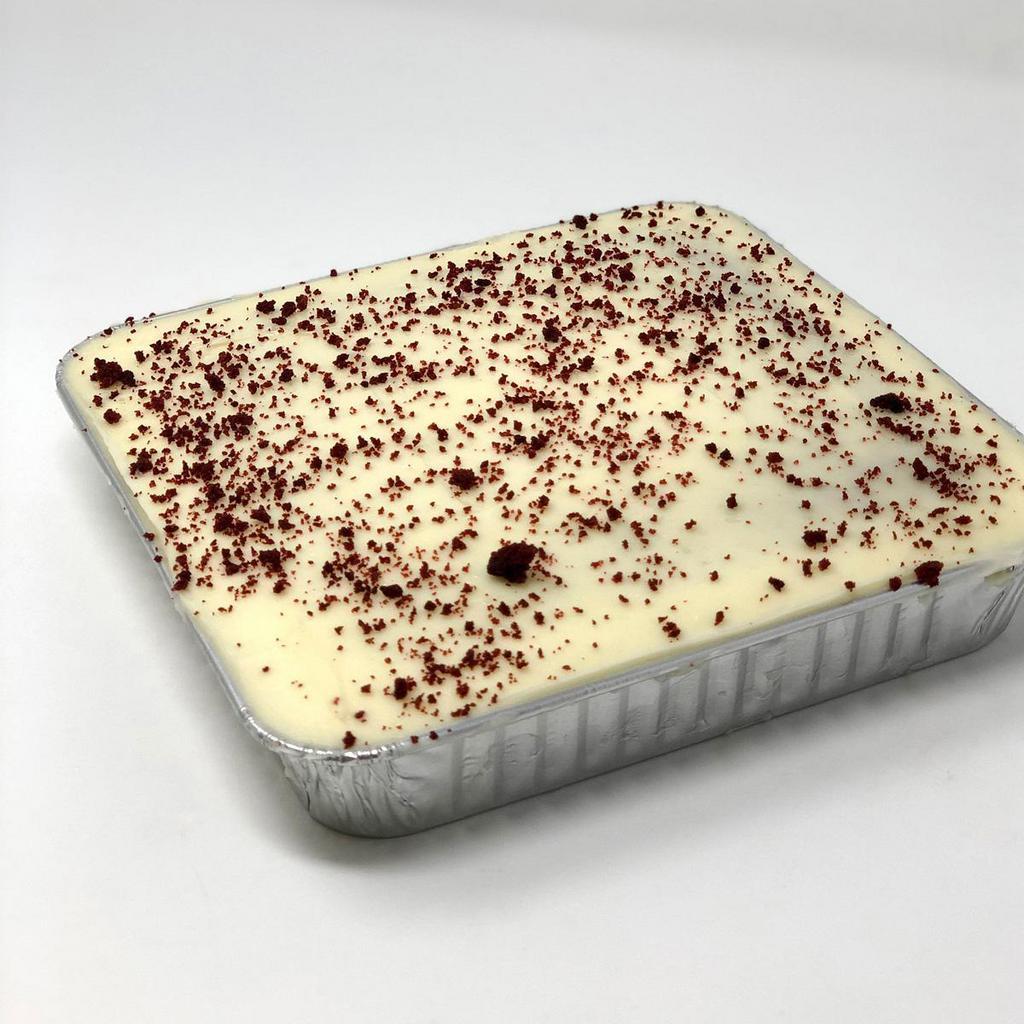 Red Velvet Snack Cake · A smaller version of our traditional red velvet cake iced in cream cheese! Baked in an 8x8 container and will serve appox. 9 people.