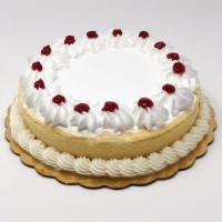 New York Cheesecake · Traditional New York style cheese cake topped in whipped cream. Sometimes simple is best!