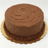 Butter Cake · 2 layers of our moist yellow cake with chocolate buttercream filling and icing. 8