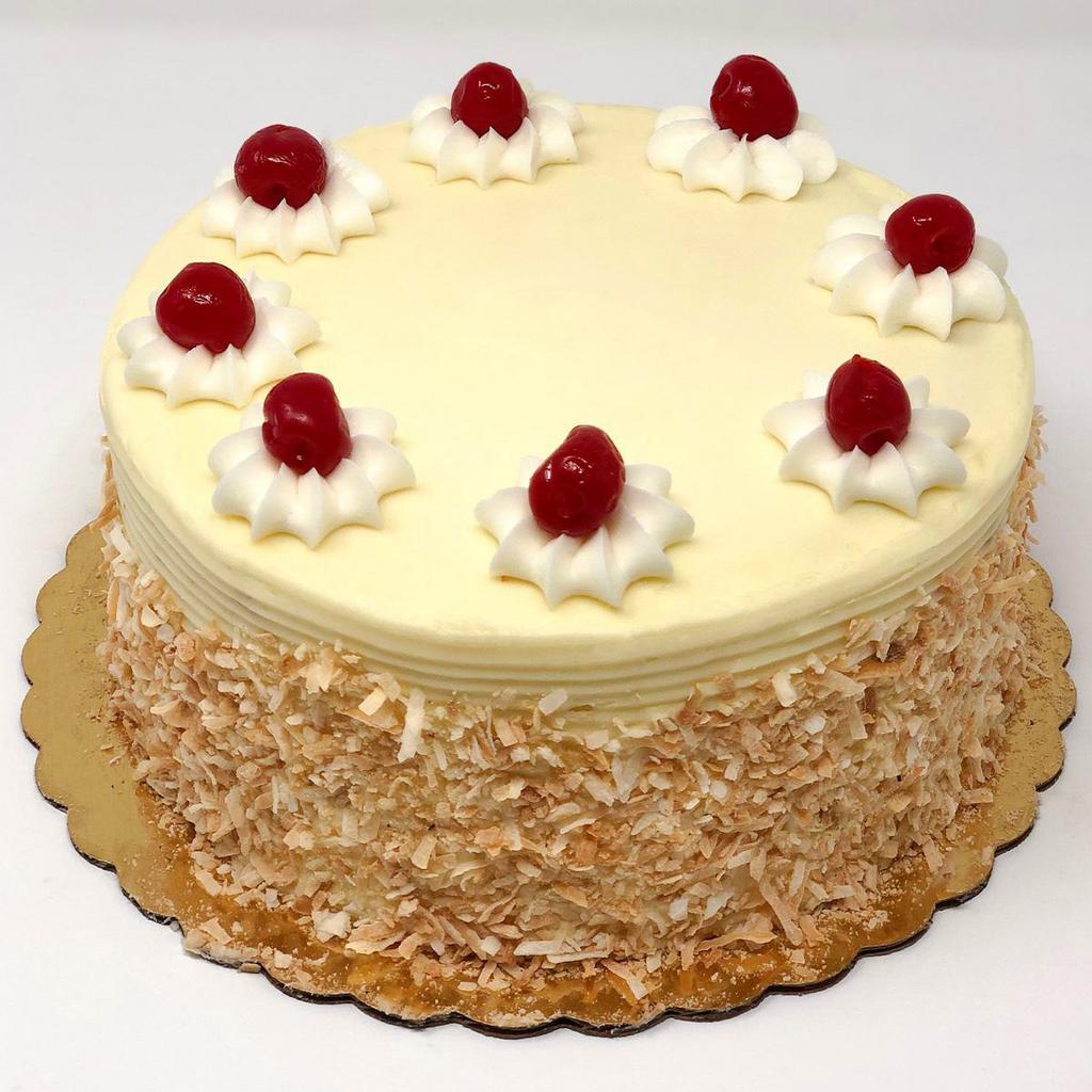 Italian Cream Dessert Cake · A buttermilk cake with pecans and coconut with a vanilla cream filling. To make it even more decadent we ice it in cream cheese.