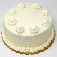 Old Fashion Vanilla Cake · White cake with white buttercream filling and icing. Simple and delightful!