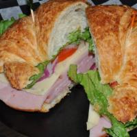 Ham & Swiss Sandwich · Ham and Swiss with lettuce and tomato on your choice of bread.
