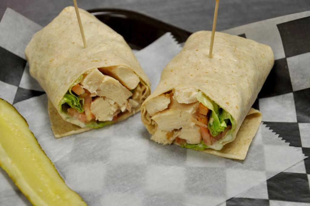 Grilled Chicken Wrap · Grilled chicken breast with lettuce, tomato and red onion with ranch dressing in a tortilla wrap.